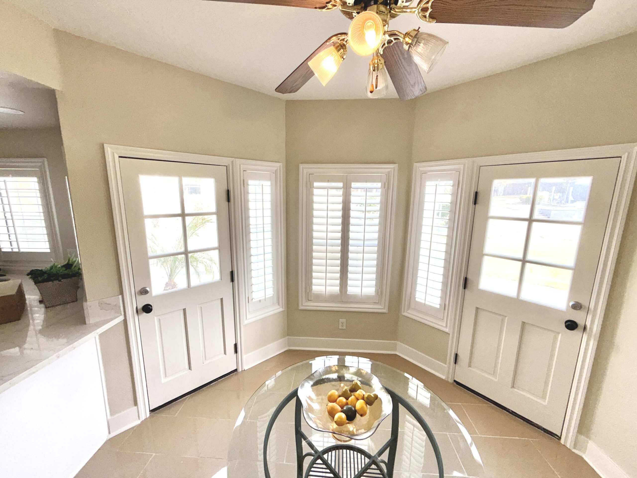 Completed home reconstruction with new flooring, painted walls, windows, and interior finishes