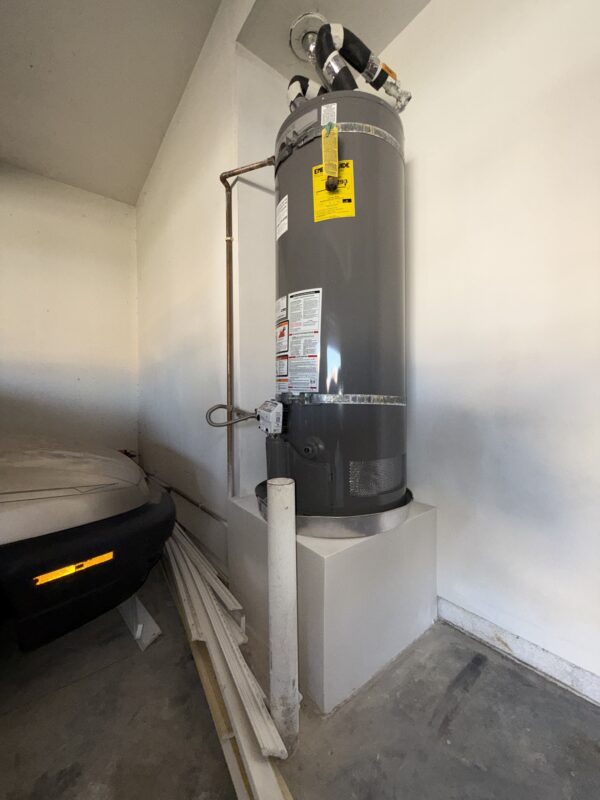 Wall behind water heater after mold remediation and cleaning