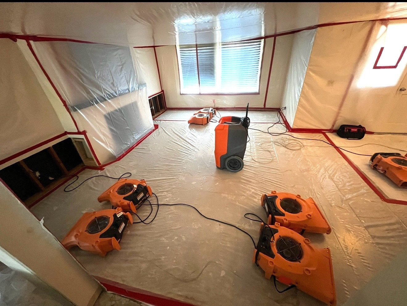 Air movers drying a water-damaged home in Riverside, CA