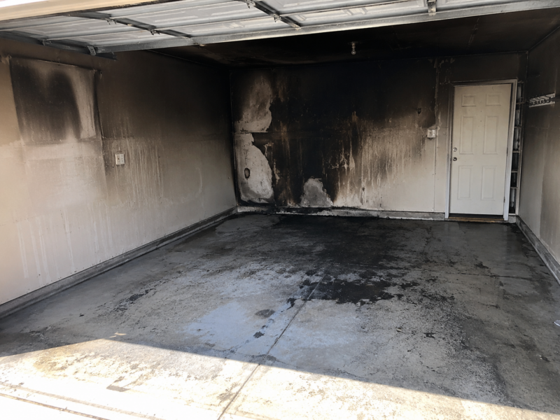 Fire and smoke damage inside residential garage