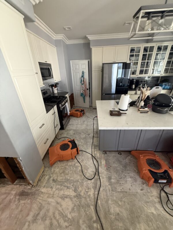 Air movers drying water damage in Ontario CA home