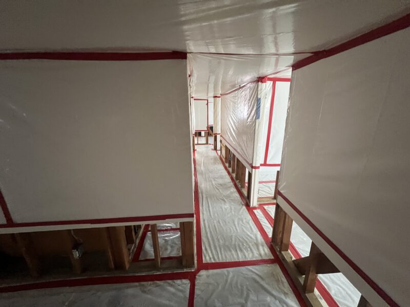 Water damage mitigation and material removal in home