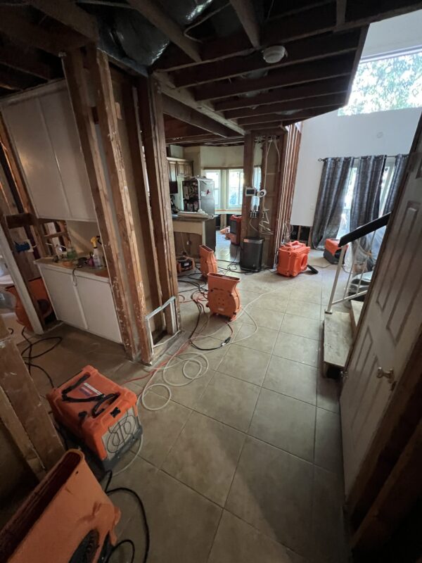 Drying equipment set up during a Corona CA water damage restoration project