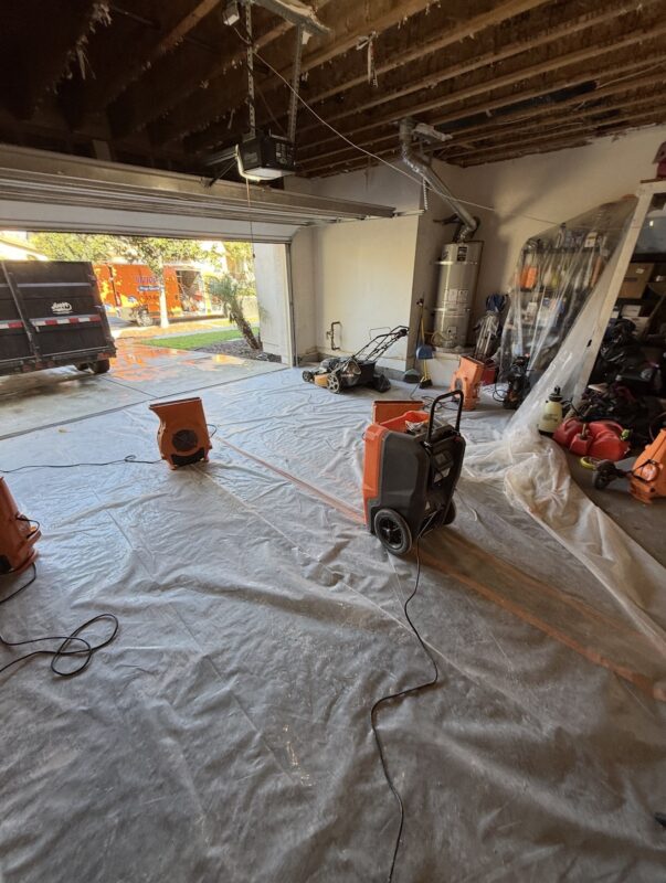 Structural drying equipment in Chino CA home after water damage